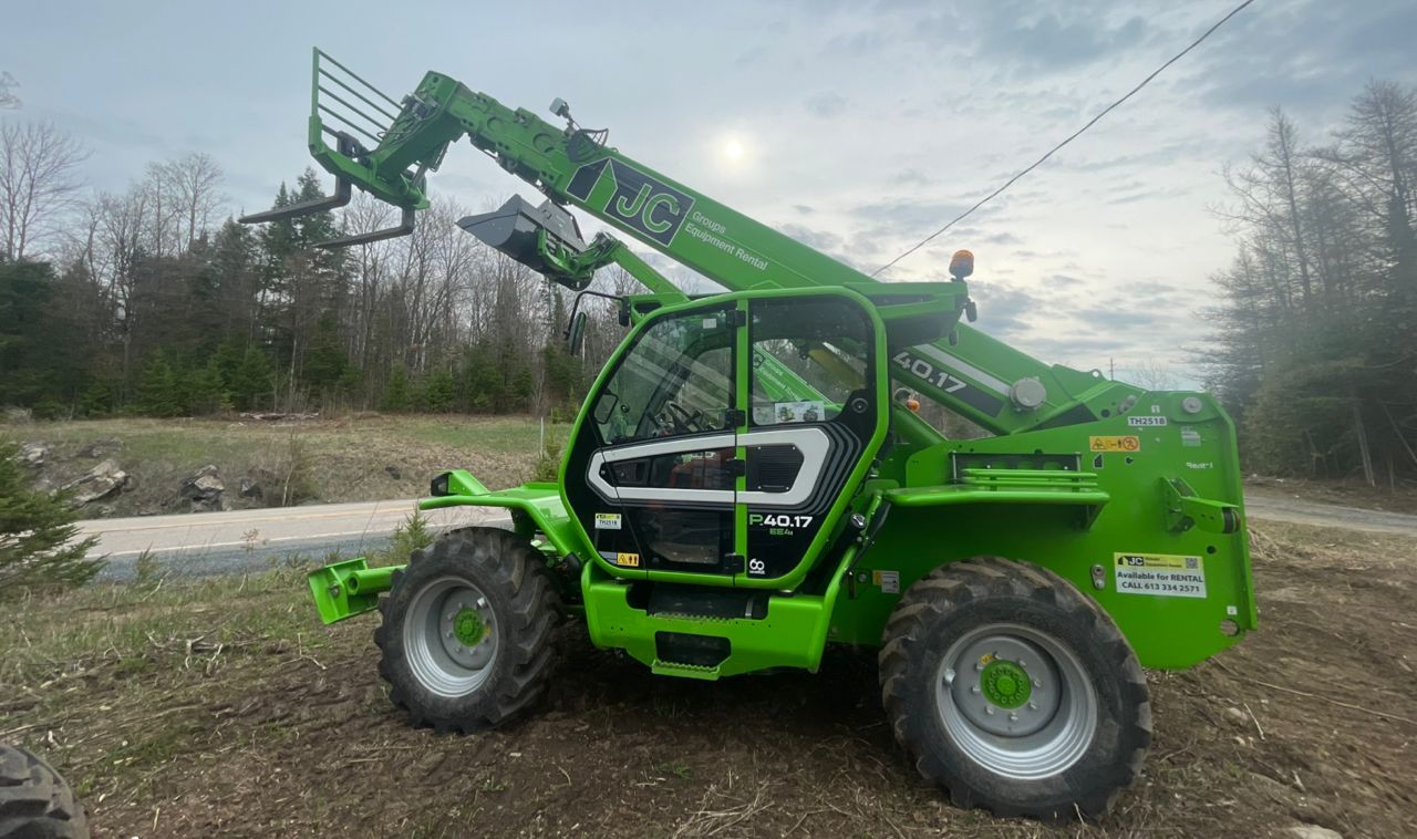 Compact loader and excavator on a worksite